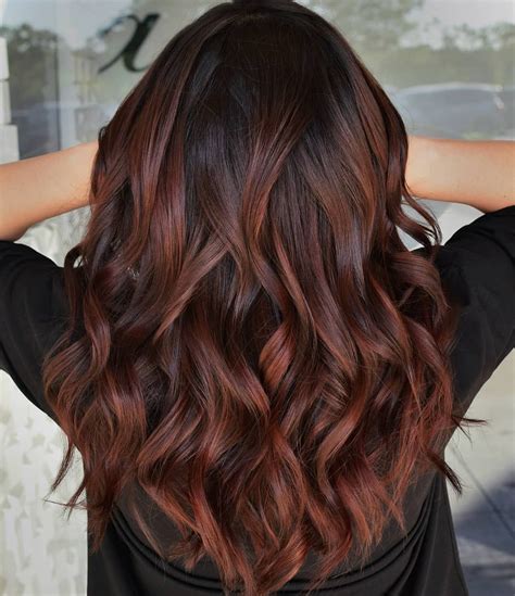 copper highlights on dark brown curly hair|35 Gorgeous Copper Brown Hairstyles for 2024